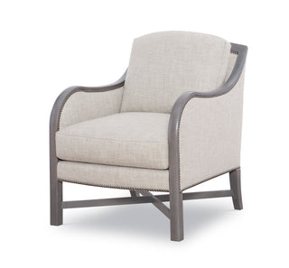 Wood frame arm chair with cushions.
