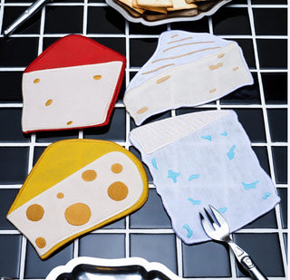 This quartet of 100% linen cocktail napkins by Piecework pays homage to the greatest hits of the cheese board—featuring brie, swiss, manchego, and blue. Perfect for wine night, picnics, or any gathering that deserves a little extra taste.
