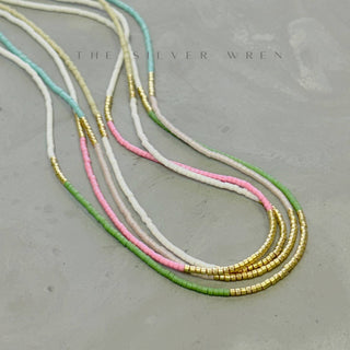 Lithe beaded necklace with a touch of gold beads- 16” Perfect for layering and adding color to your wardrobe.