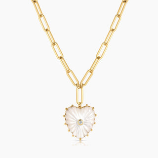 Thatch 14k gold plated 6.5mm large Allegra elongated chain withcarved mother of pearl x cubic zirconia heart pendant. Fully adjustable up to 16" in total length. Heart Pendant measures 32mm x 30mm x 8.5mm.