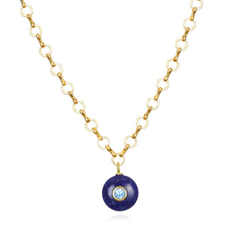 Natural lapis is set with bezeled sky blue topaz and dangles from our favorite golden petite loop chain by Amelia Rose. Adjust from 17-19" for a slightly longer length that works beautifully with layered chokers. A mesmerizing combination of eye catching lapis and sparkling sky blue topaz. 14k gold dipped sterling silver lapis pendant 14k gold plated petite loop chain Natural lapis & sky blue topaz.