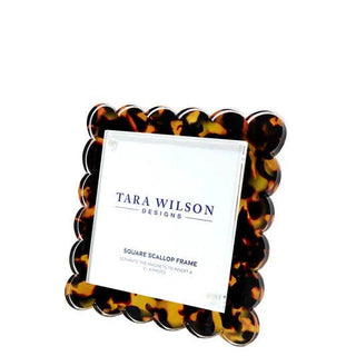 Square scalloped tortoise photo frame by Tara Wilson Designs. Dimensions: 5.5" x 5.5" (Fits a 4" x 4" photo) Details: Built in magnets for easy assembly.