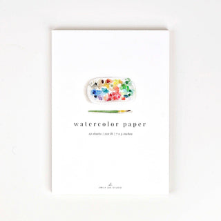 Delight in the art of watercolor with a pad of watercolor paper by Emily Lex Studio. Cold press paper has a slight texture and is beautiful to paint on with watercolors. Details: - 12 sheets of 110lb watercolor paper, tear off at top - Decorative cover and sturdy chipboard backer