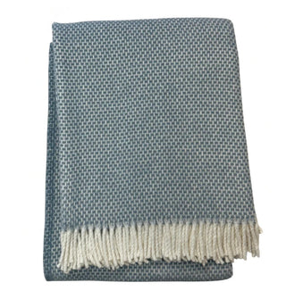 MULTI-Grain of Rice Throw by A Soft Idea is a 50% cotton, 50% microfiber acrylic throw that comes in slate. It is designed to be durable and machine washable, and is made in Spain. The throw measures 55” x 70”. Perfect for any home.