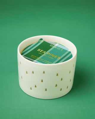 Ceramic candle with a sea pines scent by Mersea.