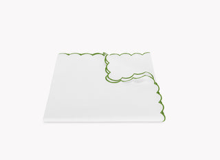 Matouk linen tablecloth with a green scalloped edge 100% linen. size 70” x 144”