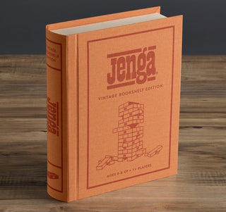Battleship Vintage Bookshelf Edition by WS Game Company. This collectible fabric-wrapped book showcases the iconic 1986 logo, adding a touch of nostalgia to your gaming experience. With its portable design, this JENGA game can be enjoyed anytime, anywhere, and in any style you prefer. Gather your loved ones and embark on endless hours of excitement

Fabric-wrapped book with integrated storage

54 Hardwood blocks

Stacking sleeve with instructions
