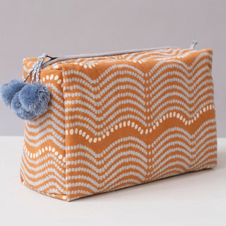 Waves Pumpkin Toiletry Bag by Graymarket Design. Printed cotton makeup bag.