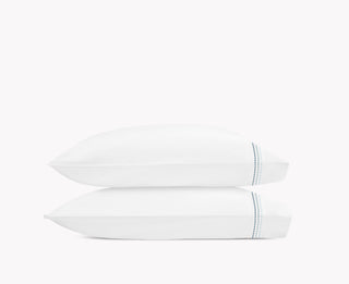 Amara Triple Pearl by Matouk is a delicate embroidered design featuring a trio of pearl-shaped strands in ombré shades. The triple pearl motif lends a creative touch to lustrous Amara sateen.

300 thread count cotton sateen. Made in India.

Care: Machine wash warm. Do not use bleach or fabric softener. Tumble dry low heat. Iron as needed.