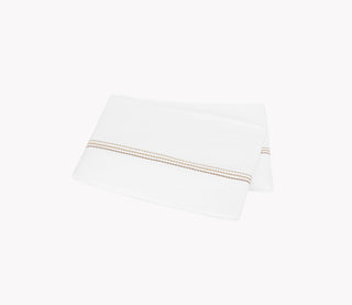Amara Triple Pearl by Matouk is a delicate embroidered design featuring a trio of pearl-shaped strands in ombré shades. The triple pearl motif lends a creative touch to lustrous Amara sateen.

300 thread count cotton sateen. Made in India.

Full/Queen: 96" W x 112" L

Care: Machine wash warm. Do not use bleach or fabric softener. Tumble dry low heat. Iron as needed.