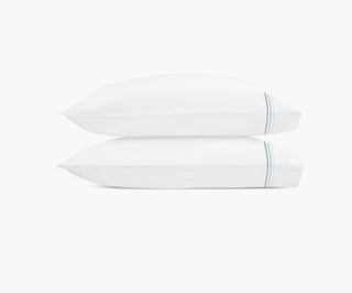 Matouk Amara Triple Pearl is a delicate embroidered design featuring a trio of pearl-shaped strands in ombré shades. The triple pearl motif lends a creative touch to lustrous Amara sateen. Comes in a pair. 
300 thread count cotton sateen. Made in India.
King: 21" W x 40" L