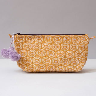Cotton printed makeup bag with a  pom pom by Graymarket Design.
Size 9”x 5” x 3.5”