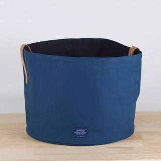 Use our Shorebags buckets as organizing bins or planters. Made of heavyweight cotton canvas and leather trim, the canvas walls are rigid enough to keep the bin upright.