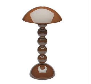 Bobbin shape lacquer cordless LED  lamp by Addison Ross. 