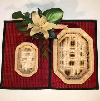 Woven of untreated "le peuk" grass by artisans in Cambodia, this handsome tray by Baskets of Cambodia will make a distinguished and environmentally conscious addition to your home. Dimensions : L13” x 6”W x 2.5” H
