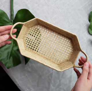 Our finely woven Rectangular Petite Tray by Baskets of Cambodia is the perfect basket for your most precious little pieces. Woven of untreated "le peuk" grass by artisans in Cambodia, this handsome tray will make a finely crafted fair trade conscious addition to your home. 

Dimensions: L X W X H

9" X 4.75" X 2.5" (w/Handle)
