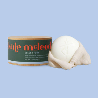 This soothing herbal Body Stone blend by Kate Mc Leod is formulated with notes of lavender and chamomile. It is the perfect addition to your evening wind-down ritual. The Body Stone is a highly efficacious cocoa butter concentrate chock full of fatty acids to deeply moisturize dry skin. The starter kit includes a reusable bamboo canister for storage.
