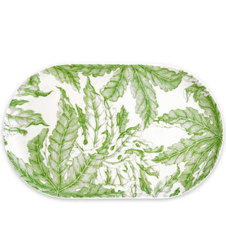 Green floral patter serving platter by Caskata. Dimensions: 16"L x 9"W • Lead-free, High-fired Porcelain, Made in Sri Lanka • Dishwasher and Microwave Safe