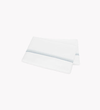 Amara Triple Pearl by Matouk  is a delicate embroidered design featuring a trio of pearl-shaped strands in ombré shades. The triple pearl motif lends a creative touch to lustrous Amara sateen. Sizing King: 114" W x 112" L

300 thread count cotton sateen . Made in India.

Machine wash warm. Do not use bleach or fabric softener. Tumble dry low heat. Iron as needed.