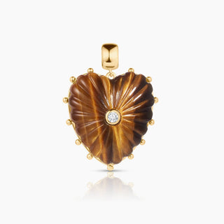 Tiger's eye heart charm with a cz stone in the center by Thatch. Measures approximately: 32mm x 30mm x 8.5mm