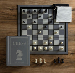 Chess Vintage Bookshelf Edition game by WS Game Company.
Fabric-wrapped book with integrated storage that comes with a
full-sized folding game board for chess
32 Wooden Chess pieces
2 Fabric pouches
Instructions