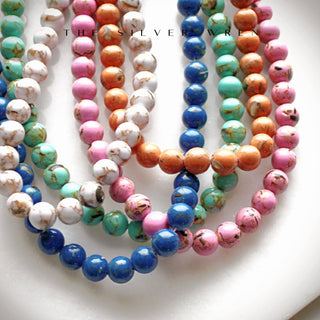 Inspired by the sun drenched desert landscape.
These dyed jade beaded necklaces by The Silver Wren are perfect for layering or a pop of color to any outfit. 
5x8mm •Adorned with 14kt gold filled accents •Beaded by hand just for you Water friendly •16 inch length plus a 2 inch extender for up to 18 inches.