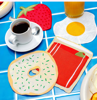 The best meal, now in napkin form. This set of four 100% linen cuties by Piecework features a bloody mary, a bagel, an egg, and a strawberry—brunch icons, immortalized in linen.
