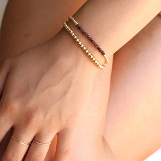3mm Garnet bead bracelet accented with 14k gold fill 2.5mm touches.