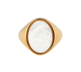 Tamarin Pinky Ring by Asha.
14k gold dipped pinky ring with mother of pearl stone engraved with our tamarin flower motif.

0.5" tall.