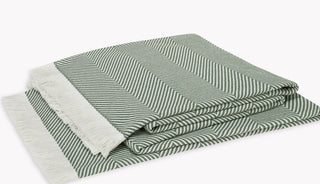 Leo is a generously oversized herringbone throw by Matouk with a soft hand and beautiful weight. Crafted from 100% cotton, it features a large herringbone pattern and short fringe for a contemporary finish. It’s available in a range of colors for any type of space and is perfect for gifting.

100% cotton. Made in Portugal.

Oversized Throw: 60" W x 90" L

Care: Machine wash warm. Do not use bleach or fabric softener. Tumble dry medium heat.