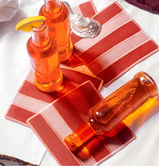 Set of 4 linen striped cocktail napkins by Piecework. Bringing a touch of Riviera ease to any table—from aperitivo hour to golden hour and beyond.
