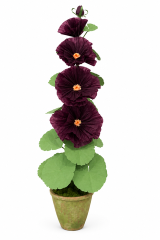 The Green Vase handmade paper hollyhock flower topiary in a small green pot, featuring four dark burgundy-purple blooms with orange centers and green leaves on a white background.
Regular plant is approximately 28.5” tall, 11” at widest point. Pot measures 6.5" high and 7" in diameter.