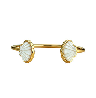 Asha Sankaty Cuff- Mop
Wear our clam shell cuff on its own or pair with other bracelets for a lovely, layered look. Gold dipped cuff with mother of pearl stone.