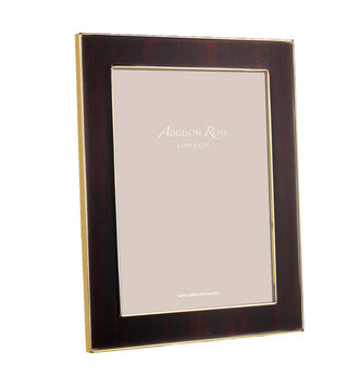 Enameled rich grain wood with a gold trim 5x7 picture frame by Addison Ross.