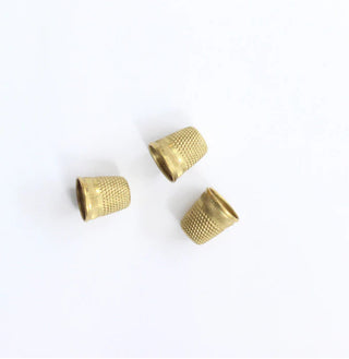 thimble with a gold plated finish to add shine