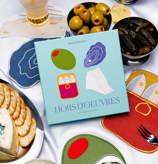 Set of 4 linen cocktail napkins by Piecework in the following shapes, Olive, wedge of brie cheese, a sardine tin, and an oyster.