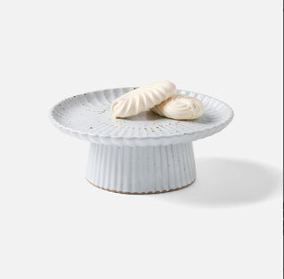 Cake stand by Blue Pheasant in white salt glaze dimensions: 9.5D”x 3.5”H