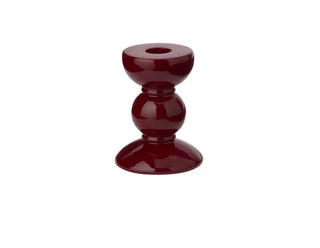 Acrylic lacquered bobbin shape candle stick holder by Addison Ross. 