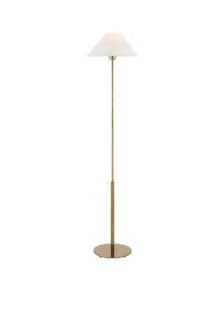 Floor Lamp by Visual comfort in hand rubbed antiqued brass with a linen shade. H 52.25”