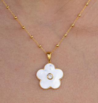 Azalea charm with mother of pearl and white topaz center