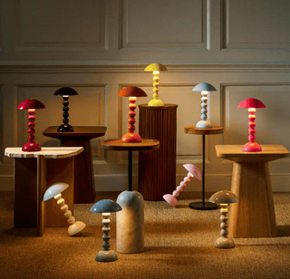 Addison Ross bobbin table lamps in all offered colors on occasional tables.