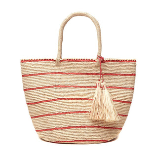Costa Tote in coral by Mar Y Sol. Striped coral raffia tote. 100% crocheted raffia with an  inside pocket and snap closure. Raffia tassels * 18” x 15” x 12”; 8“ Strap Drop - Approximate dimensions, each piece is handmade