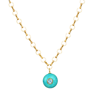 Natural green turquoise is set with bezeled sky blue topaz and dangles from our favorite golden petite loop chain by Amelia Rose. Adjust from 17-19" for a slightly longer length that works beautifully with layered chokers. A mesmerizing combination of eye catching turquoise and sparkling sky blue topaz. 14k gold dipped sterling silver turquoise pendant 14k gold plated petite loop chain Natural turquoise & sky blue topaz.