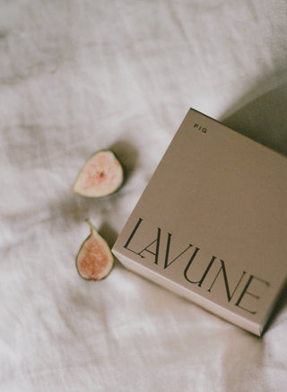  Lavune fig candle highlighted has notes of freshly picked green fig and quince, with a touch of musk, building a luscious blend. 