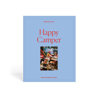  Piecework Happy Camper is a 1000-piece puzzle,  tribute to the great outdoors, brimming with camp snacks, flapjacks, lanterns, and evergreen magic. Relive the joy of lakeside mornings and campfire nights—all the cozy camp vibes, none of the mosquitoes. 
