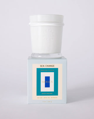 SEA CHANGE Candle by Mersea with scents of sea salt, white tea and driftwood. Size 9 oz. 