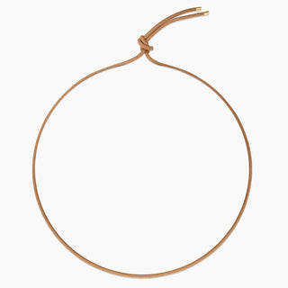 Leather cord necklace with gold plated brass by Thatch. Length 32.5"