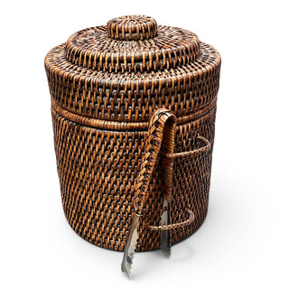 Rattan ice bucket with thermos liner  by Matahari with serving thongs for ice. Dimensions 8”x8”x10”.