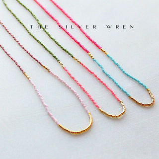 Handmade in the Arizona desert, these lightweight beaded necklaces by The Silver Wren feature vibrant seed beads and gold accents for an effortless boho-western look. •Hand strung in a modern pattern •14kt Gold-Filled clasp & extender •Adjustable 16–18" length for effortless layering.