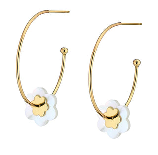 Gold dipped flower hoop-la earring with a stacked gold flower on a bigger mother of pearl flower. 